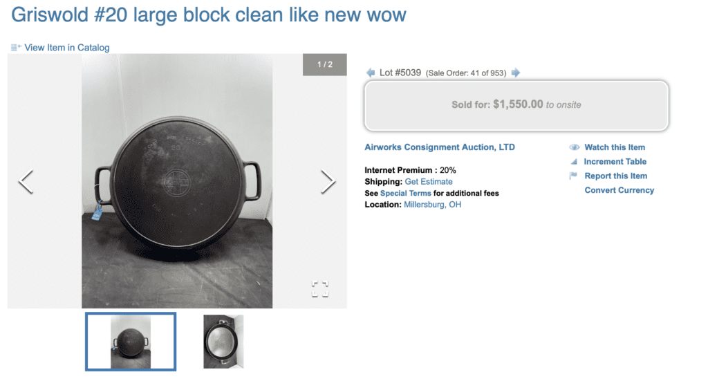 Photo of large antique cast iron skillet showing sold price of $1,550.00 for Griswold number 20 cast iron hotel skillet. 